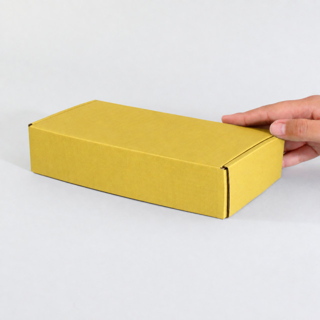 Caja autoarmable 19x10x4 amarilla Alternativa